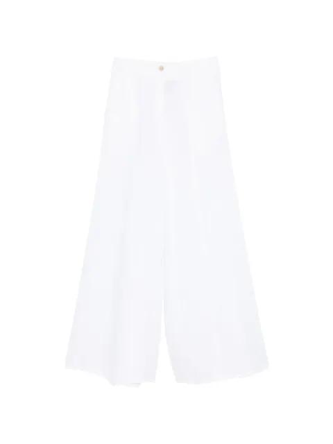 button-detail trousers by SEMICOUTURE