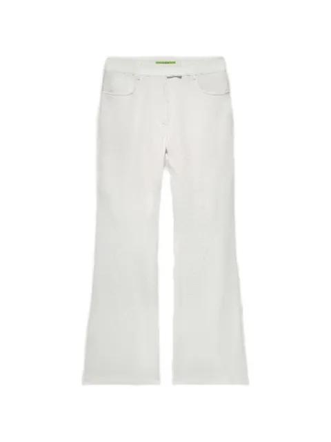 Tang textured flared trousers by SHANGHAI TANG