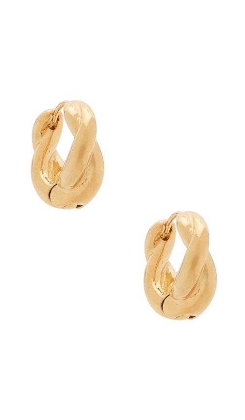 SHASHI Houghton Huggies Earrings in Metallic Gold by SHASHI