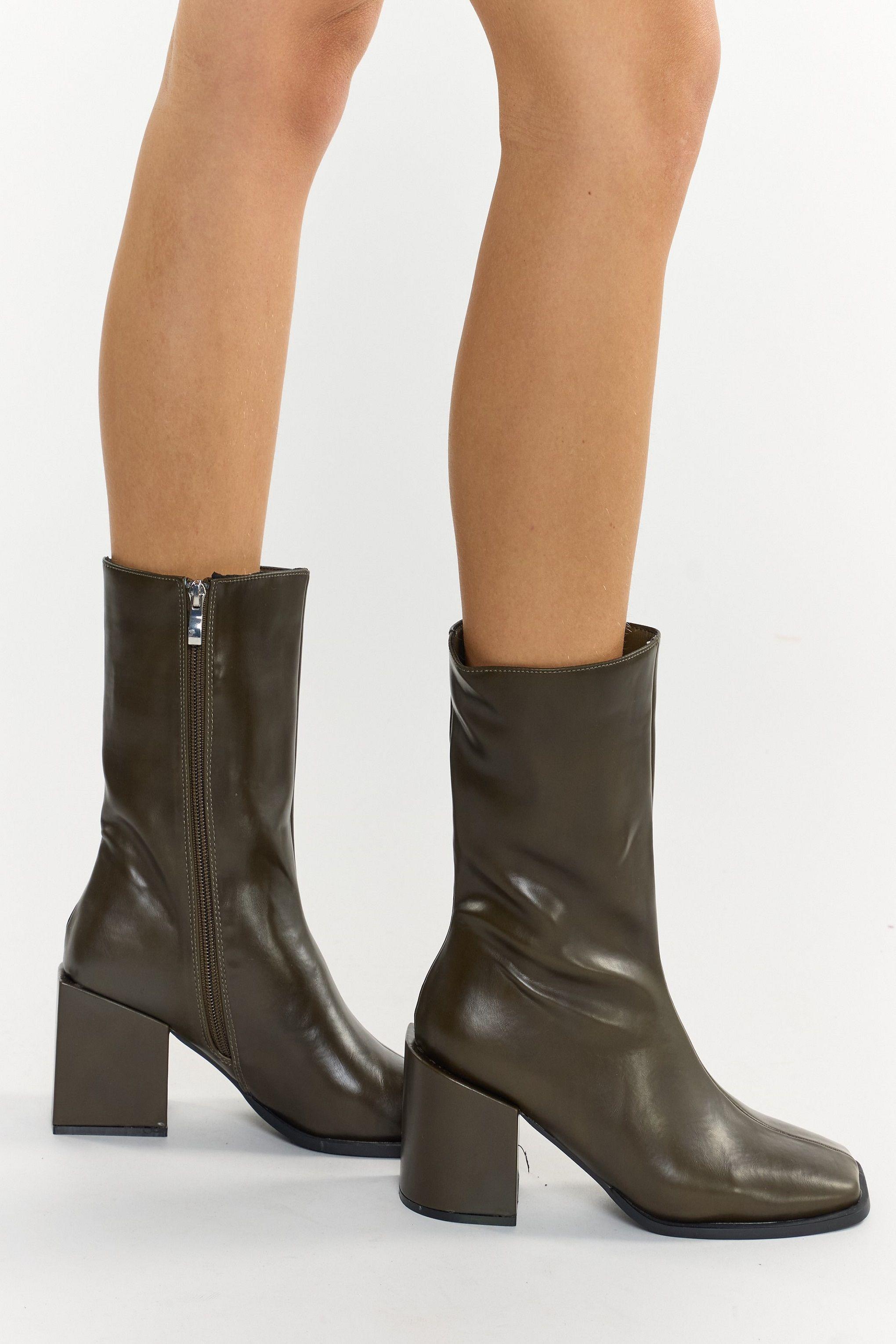 Block heel square toe boots by SHNOO