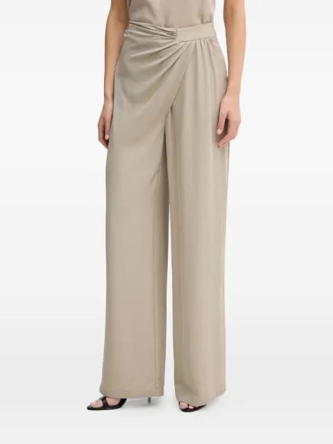 twisted trousers by SIMONA CORSELLINI