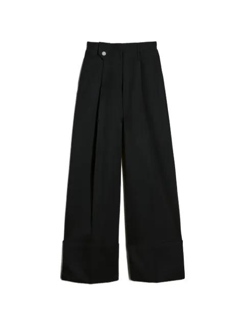 button-detail trousers by SIMONE ROCHA