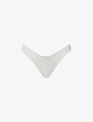 Dipped mid-rise stretch-cotton jersey thong by SKIMS