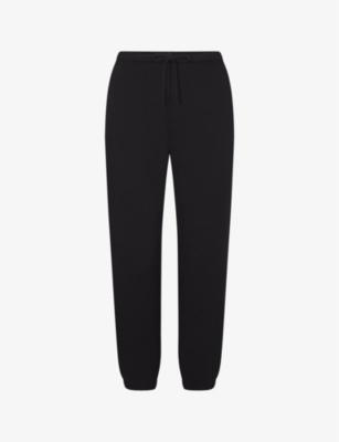 Elasticated-waist fleece jogging bottoms by SKIMS