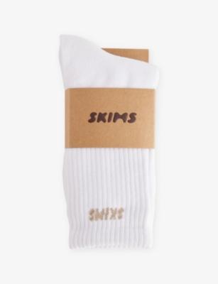 Logo-Print Ribbed Pack of Three Cotton-Blend Crew Socks by SKIMS