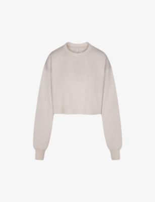 Loose-fit cropped cotton-blend sweatshirt by SKIMS
