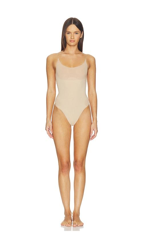 SKIMS Sheer Seamless Thong Bodysuit in Nude by SKIMS