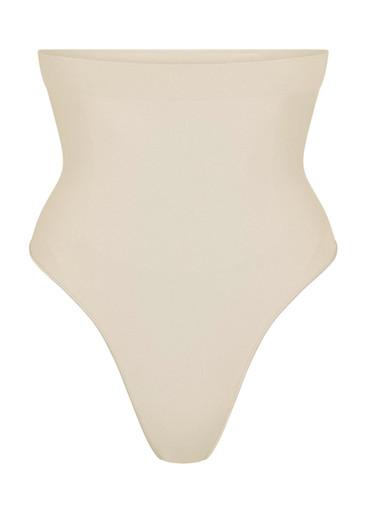 Seamless sculpt high-waisted thong by SKIMS