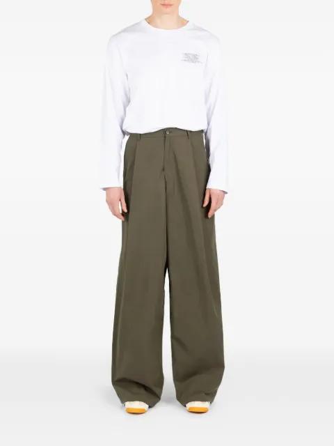 pleated trousers by SOCIETE ANONYME