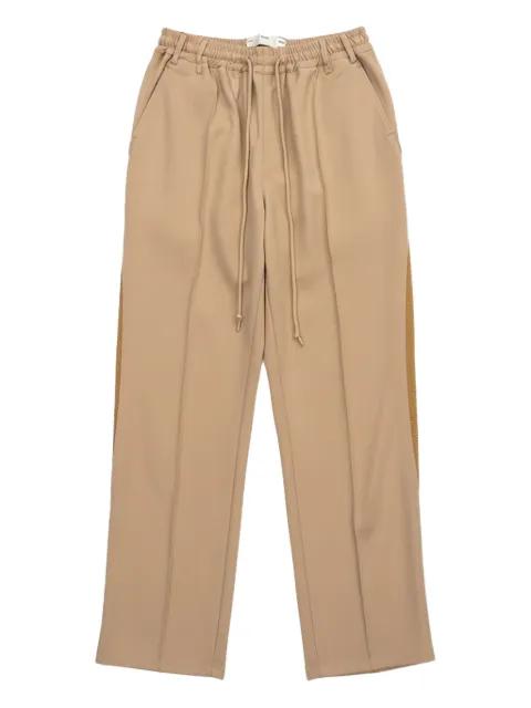 Teardrop rear welt pocket track pants by SONG FOR THE MUTE