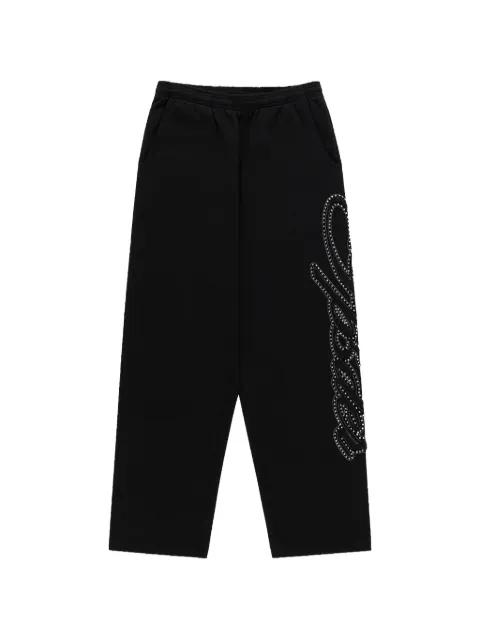 rhinestone-embellished track pants by SP5DER