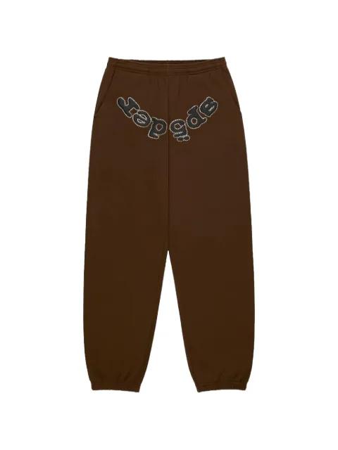 rhinestone-logo trousers by SP5DER