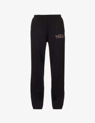 Resort tapered mid-rise cotton-jersey jogging bottoms by SPORTY&RICH