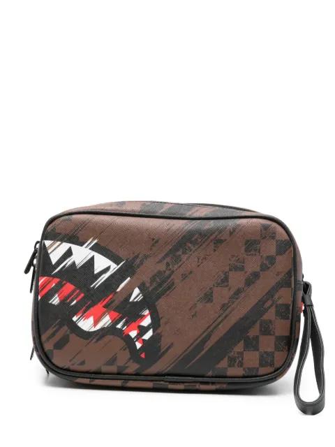 Shark Mouth checkered clutch bag by SPRAYGROUND