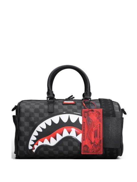 shark-mouth checkered duffle bag by SPRAYGROUND