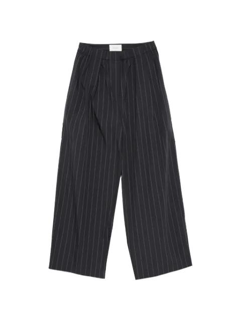 striped pleated trousers by ST. AGNI