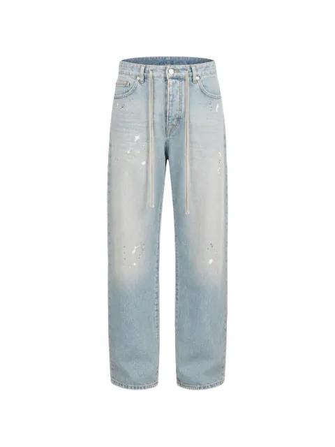 paint-splatter drawstring jeans by STATE OF ORDER