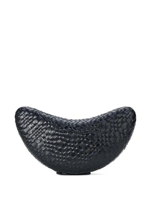 Crescent woven clutch bag by STAUD