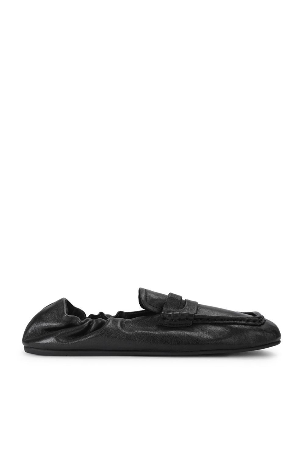 'Eurry Black' Leather Flats by STEVE MADDEN