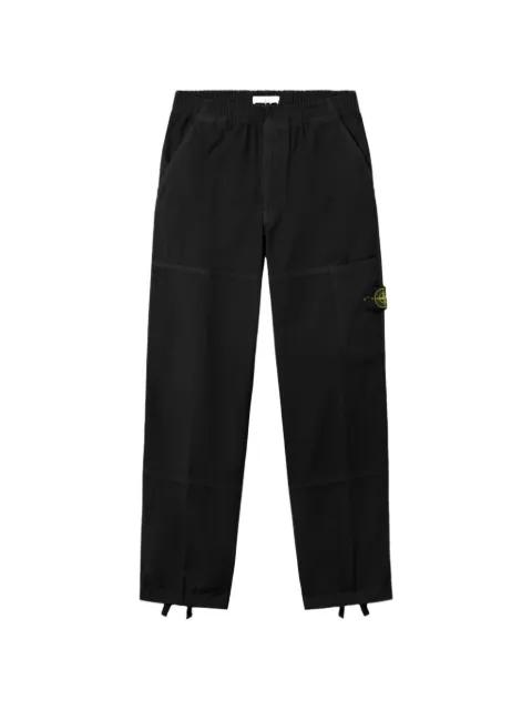 3100005 logo-patch trousers by STONE ISLAND