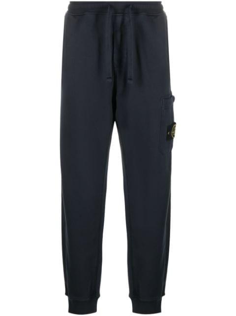 Compass-badge cotton track pants by STONE ISLAND