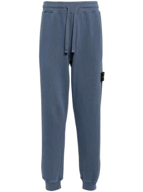 Compass-badge cotton track pants by STONE ISLAND