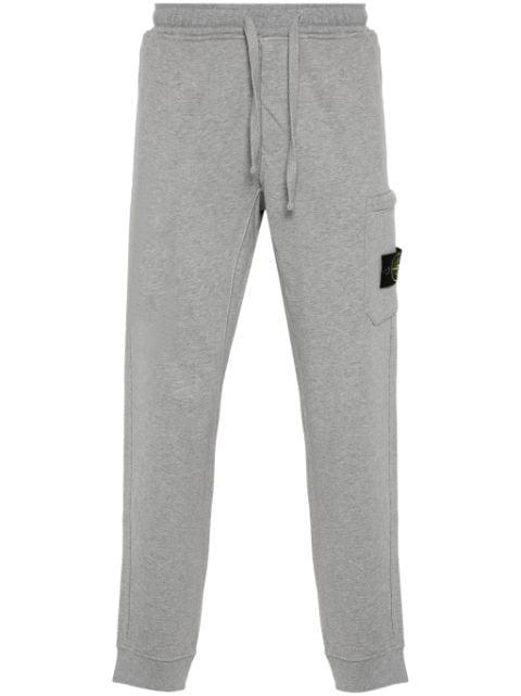 Compass-badge mélange tapered trousers by STONE ISLAND