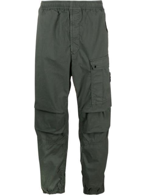 Compass-badge tapered-leg trousers by STONE ISLAND
