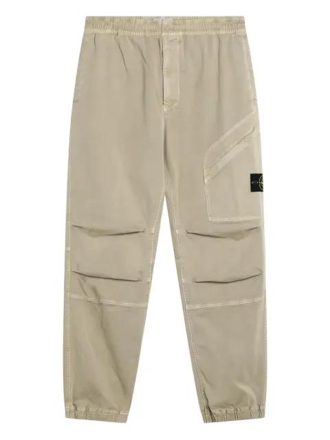 Compass-badge trousers by STONE ISLAND