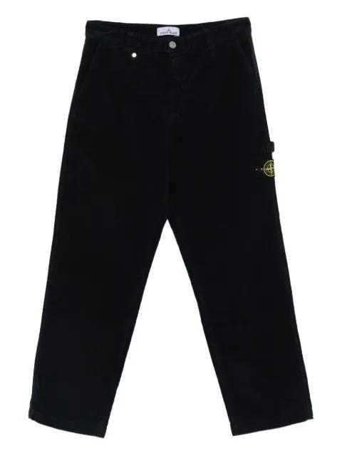 Compass-badge trousers by STONE ISLAND