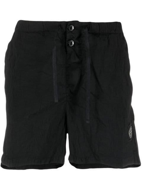 Compass-motif swim shorts by STONE ISLAND