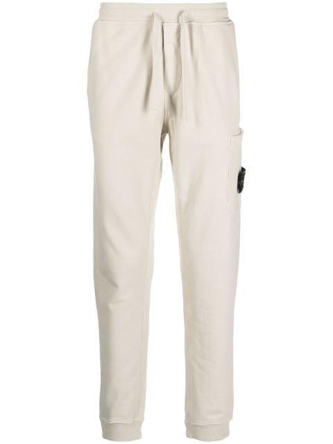 Compass-patch cotton track pants by STONE ISLAND