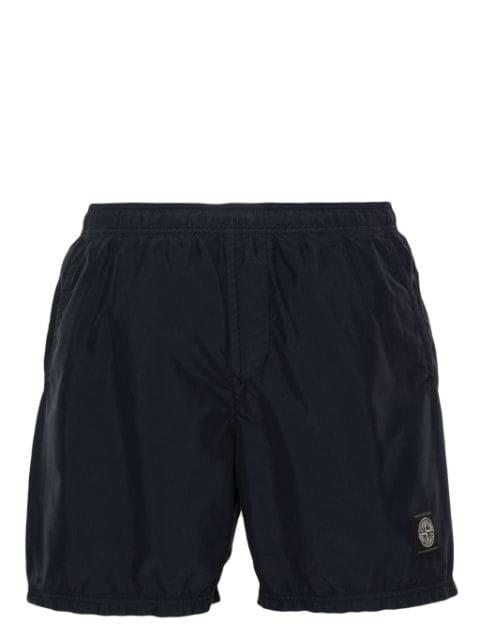 Compass-patch swim shorts by STONE ISLAND