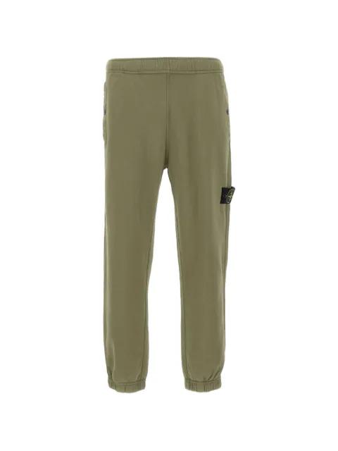 back pocket badge track pants by STONE ISLAND