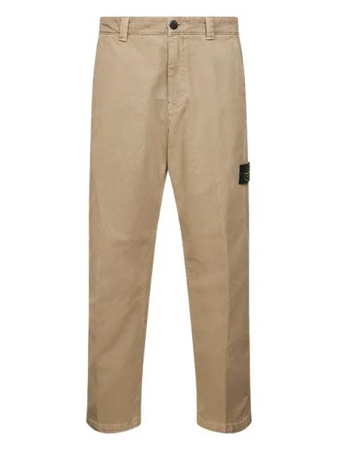 logo-badge trousers by STONE ISLAND