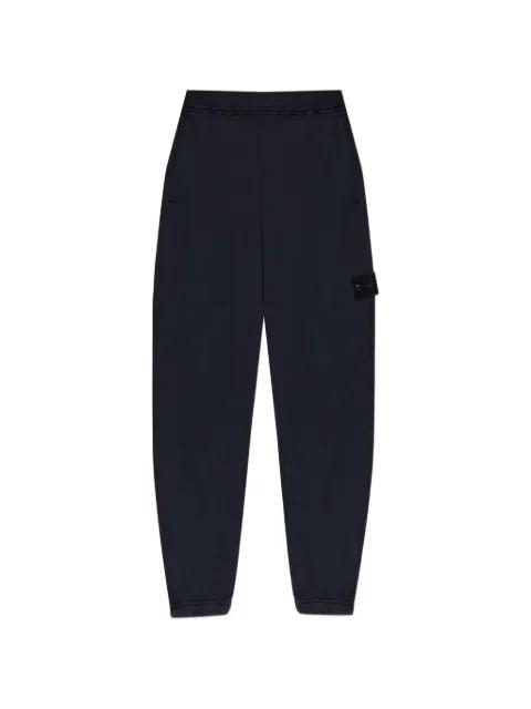 logo-patch track pants by STONE ISLAND