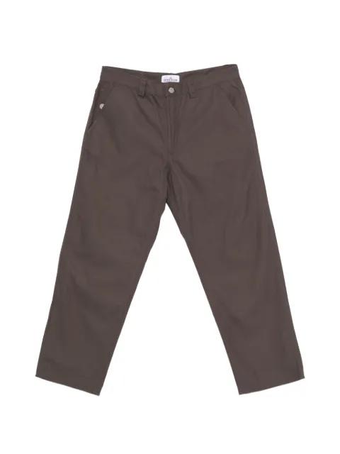 logo-patch trousers by STONE ISLAND