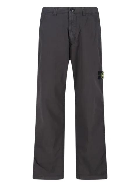 logo-patch trousers by STONE ISLAND