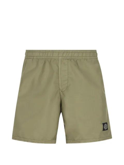 logo swim shorts by STONE ISLAND
