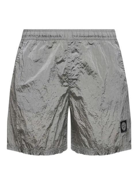 logo swim shorts by STONE ISLAND