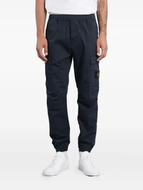 pocket cargo pants by STONE ISLAND