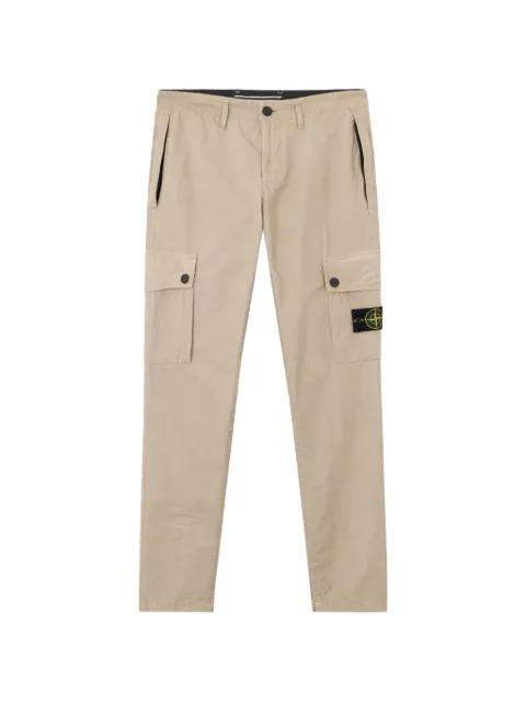 pocket cargo trousers by STONE ISLAND
