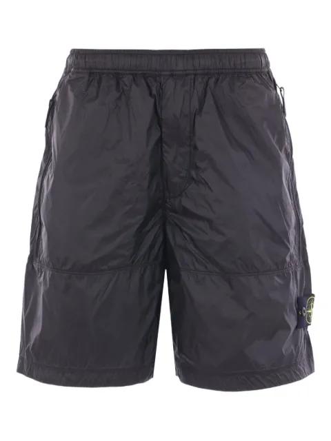 zip-pockets shorts by STONE ISLAND