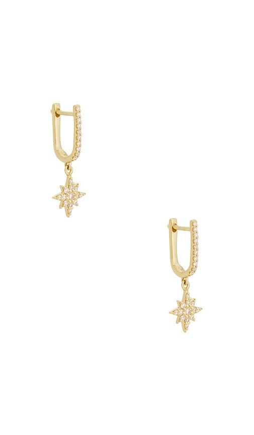 STONE AND STRAND Northern Star Pave Huggie Earrings in Metallic Gold by STONE&STRAND
