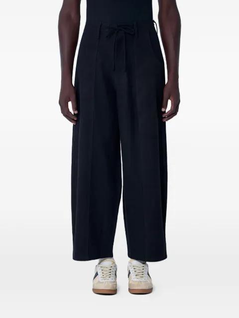 Document drawstring straight-leg trousers by STORY MFG.
