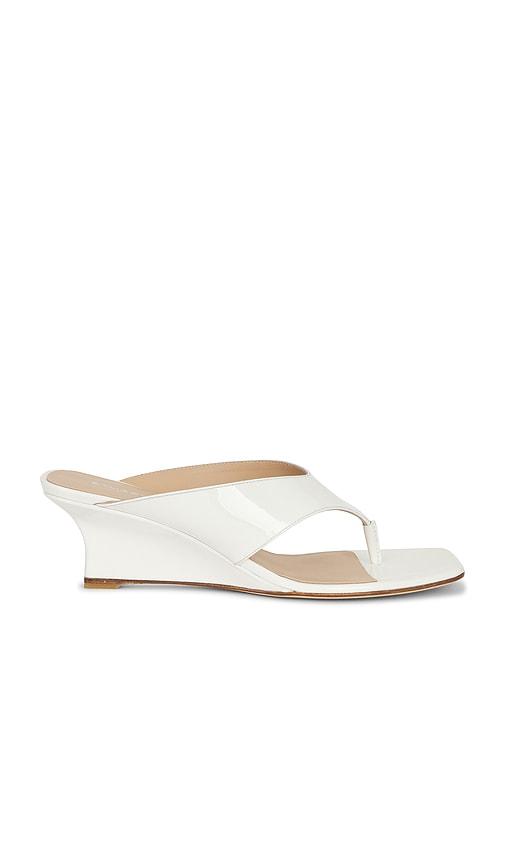 Stuart Weitzman Vinnie Wedge Thong Sandal 50 in White by STUART WEITZMAN