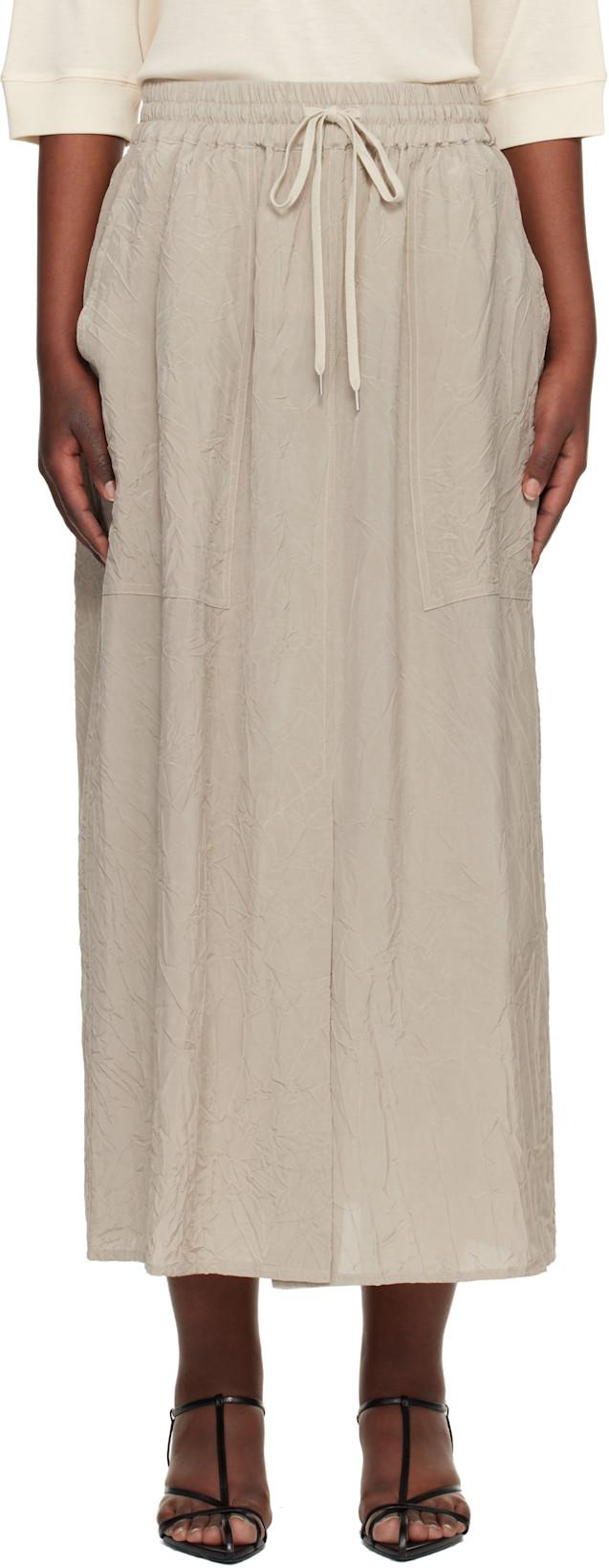 Beige Oates Midi Skirt by STUDIO NICHOLSON