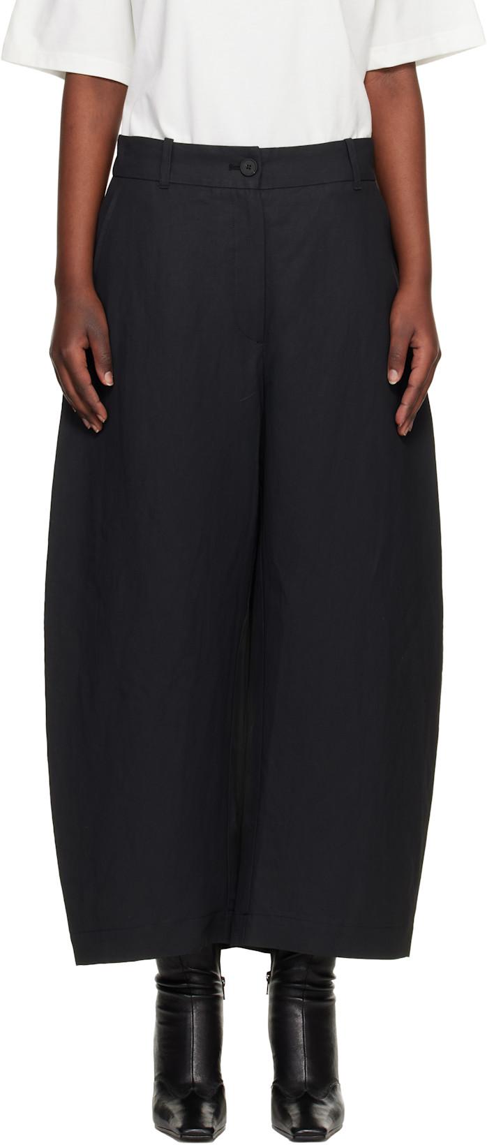 Black Chalco Linen Trousers by STUDIO NICHOLSON