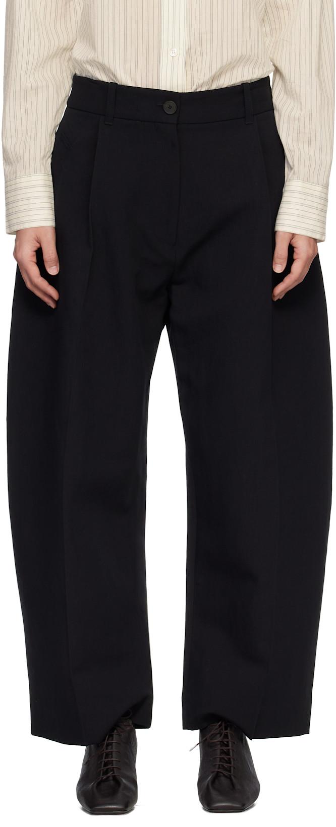 Black Minos Trousers by STUDIO NICHOLSON