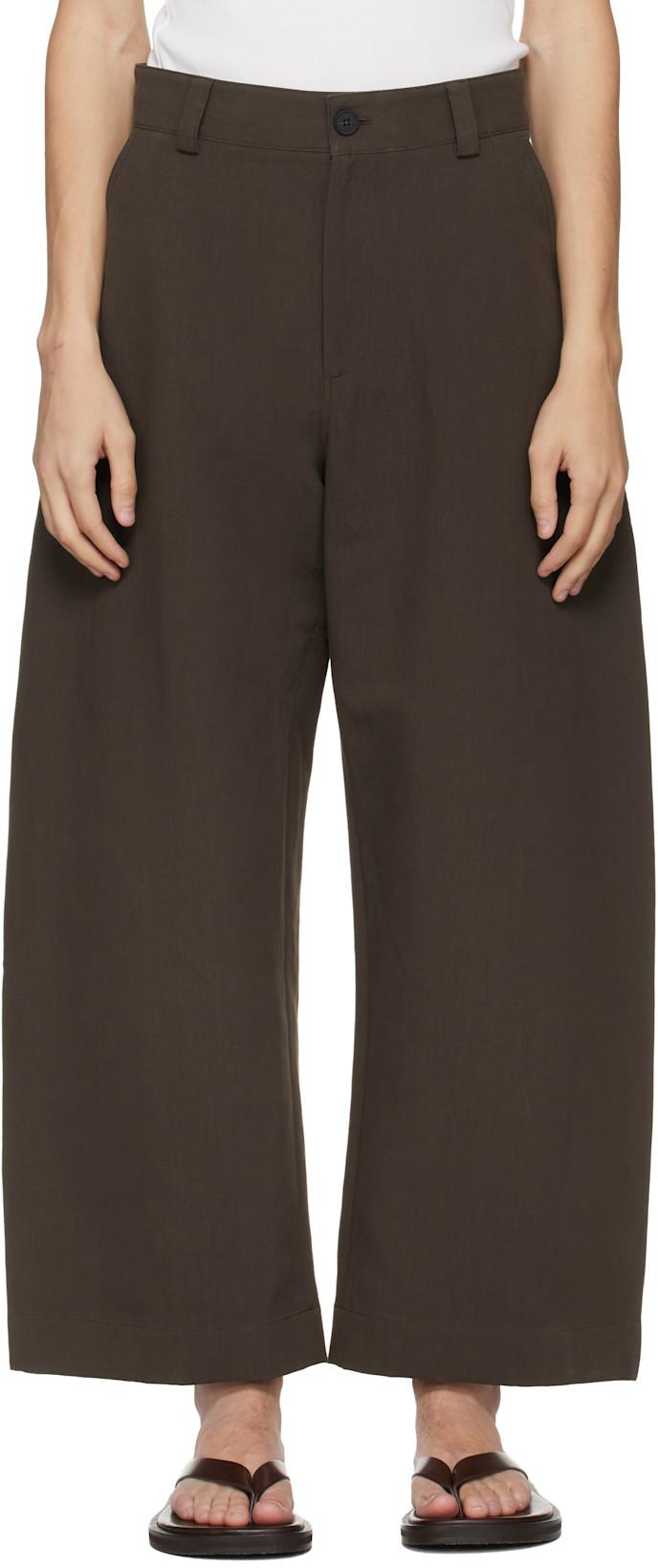 Brown Levy Trousers by STUDIO NICHOLSON